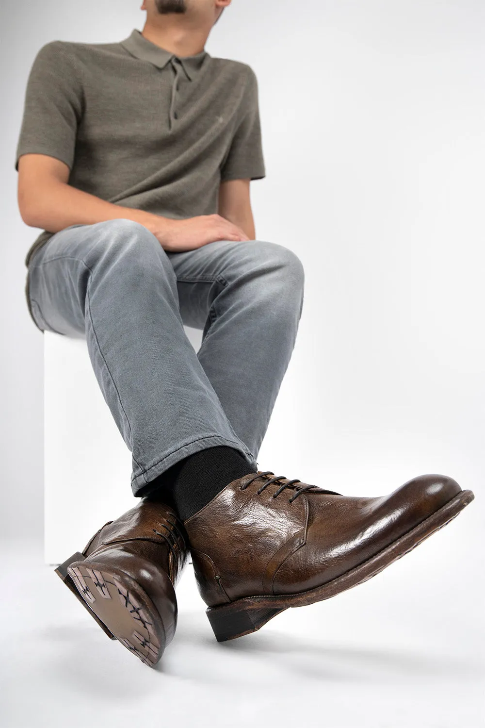 KNIGHTON moss-green low chukka boots.