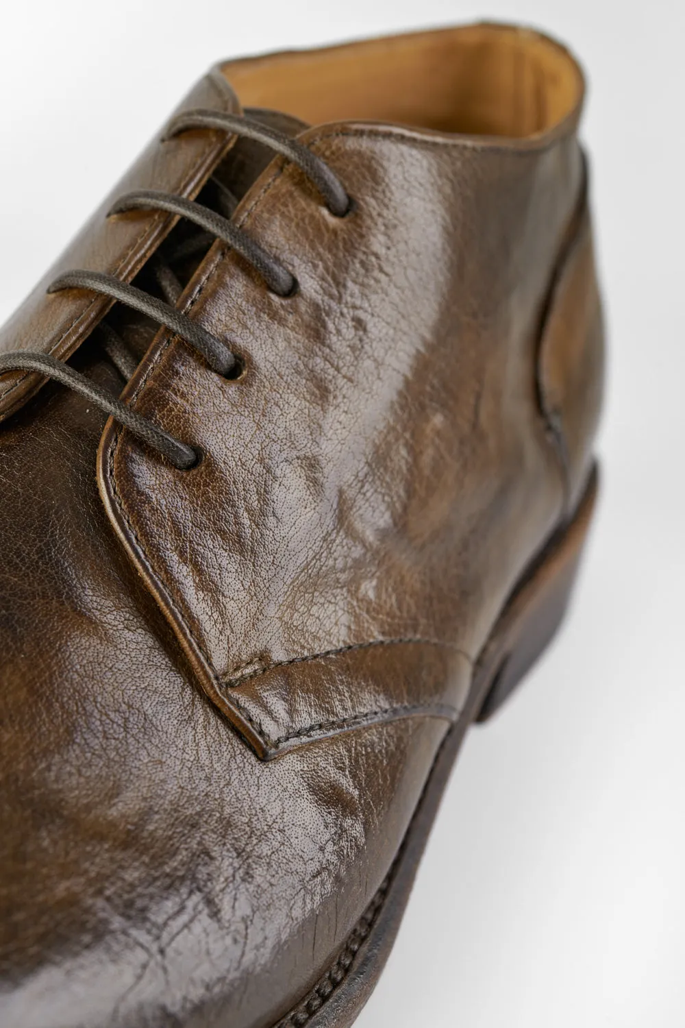 KNIGHTON moss-green low chukka boots.