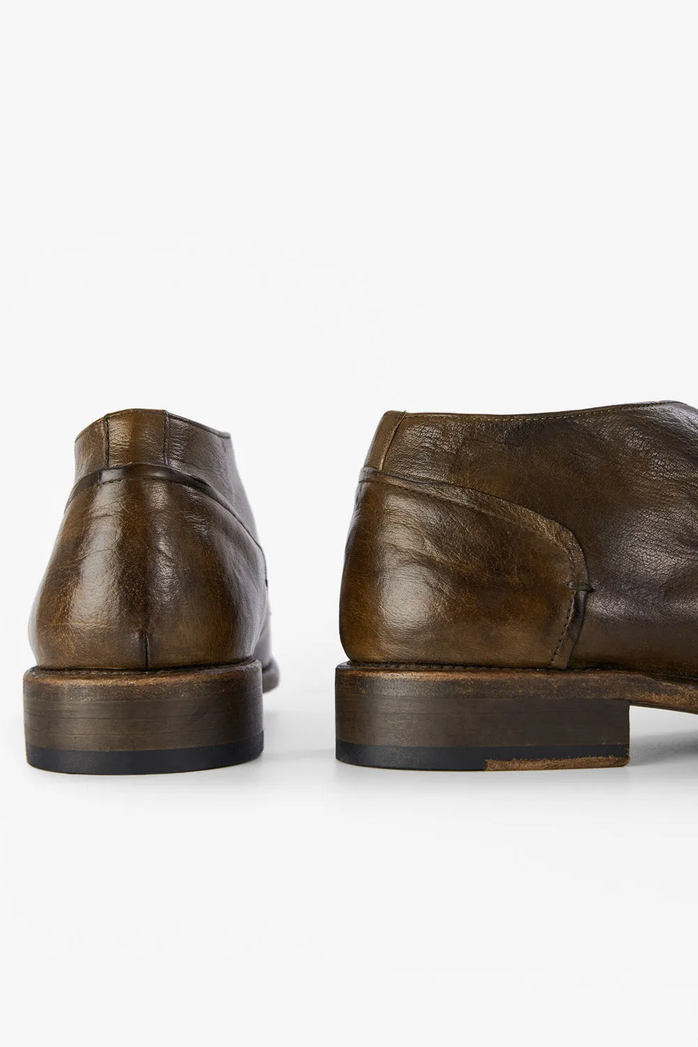 KNIGHTON moss-green low chukka boots.