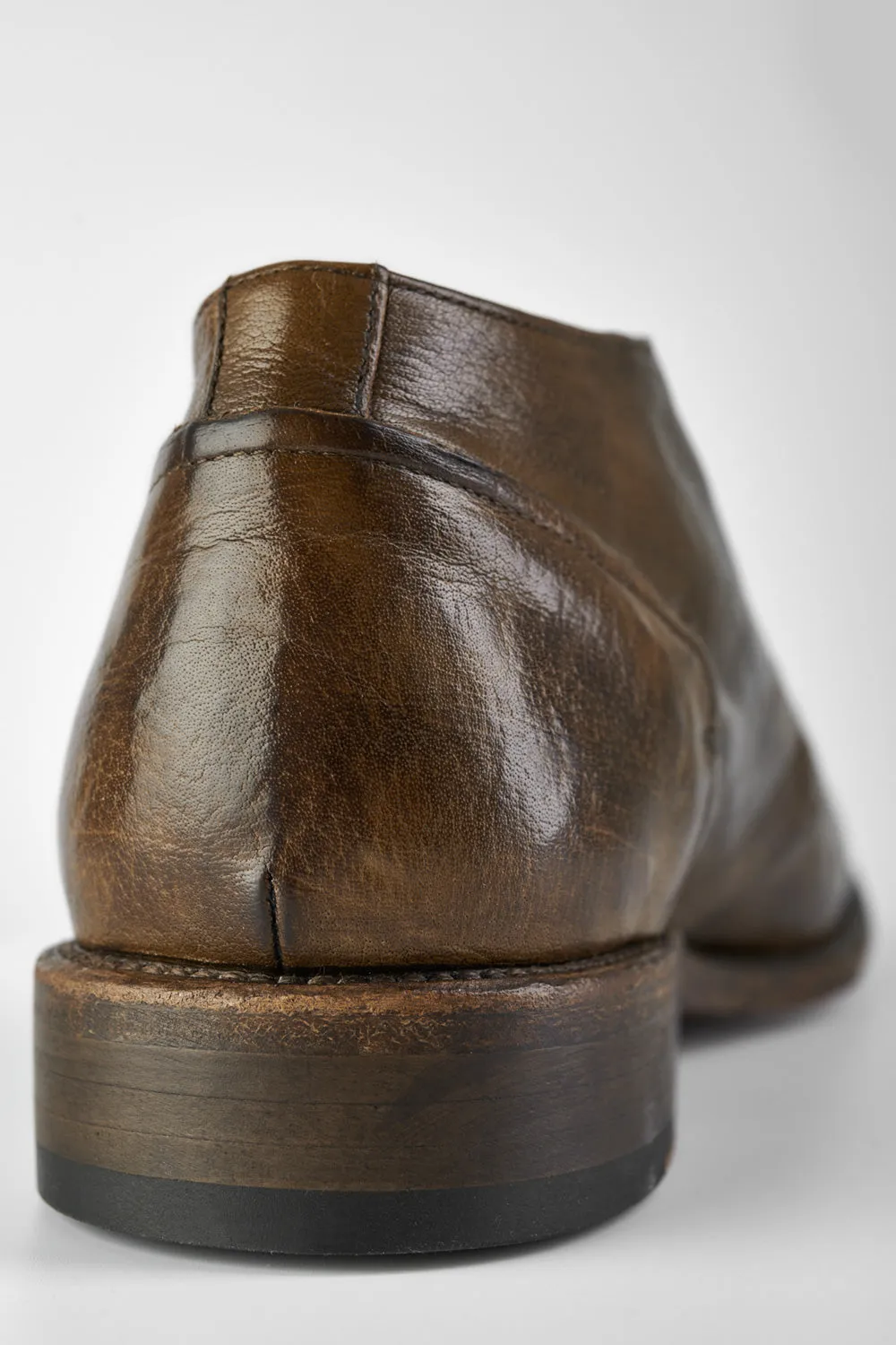 KNIGHTON moss-green low chukka boots.